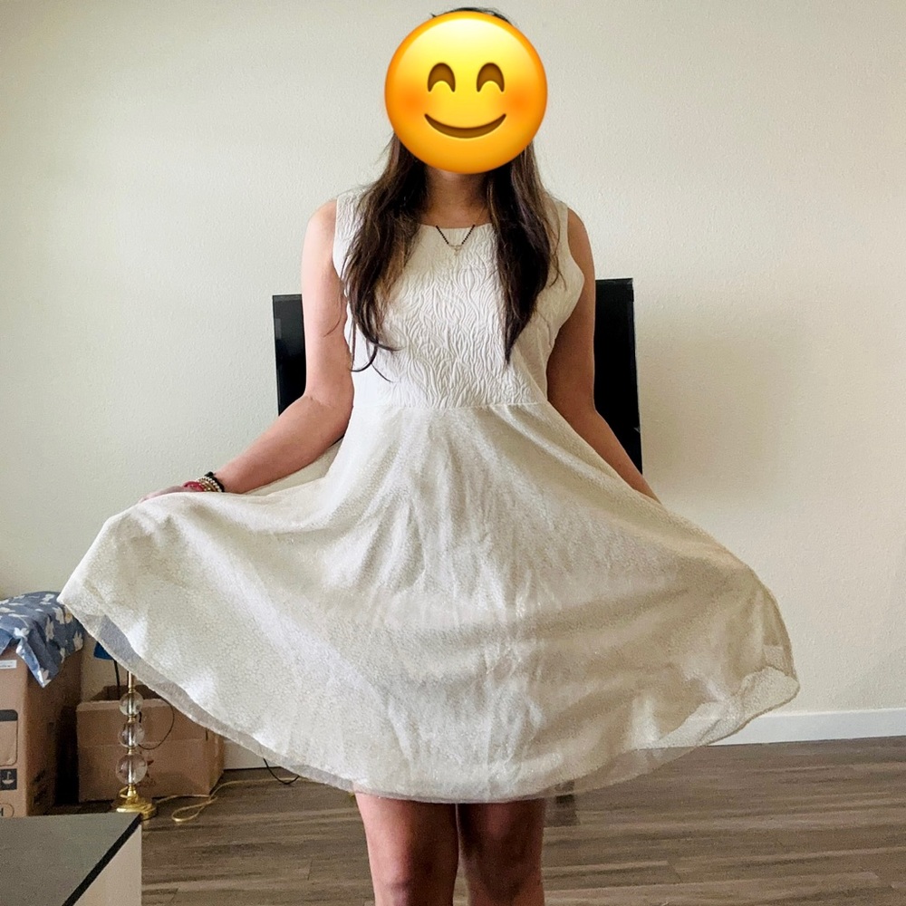Stunning Off-White Subtle Shimmery knee length party dress